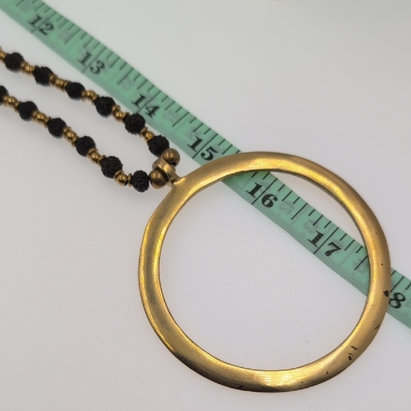 Nataraj Elegant Gold and Black Necklace with Circular Pendant - Picture 6 of 6